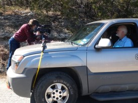 Rodger sets the camera while Bill watches