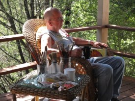 Paul (John Daws) ponders the Big Painting. 