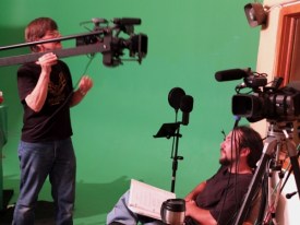 Rodger Marion adjusts the camera for Scene 39 with Jason Foreman 