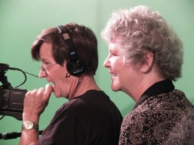 Rodger and Carla watch the playback