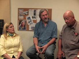 Sarah Pennington listens as Jay Penninton and John Daws discuss Rusty's fate